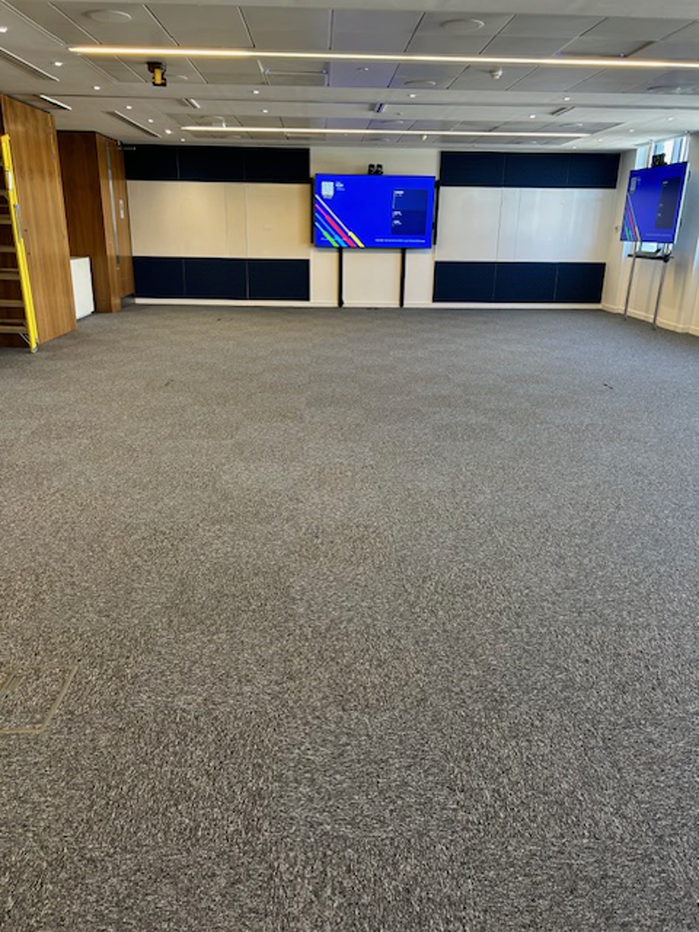 Conference room after carpet tile replacement