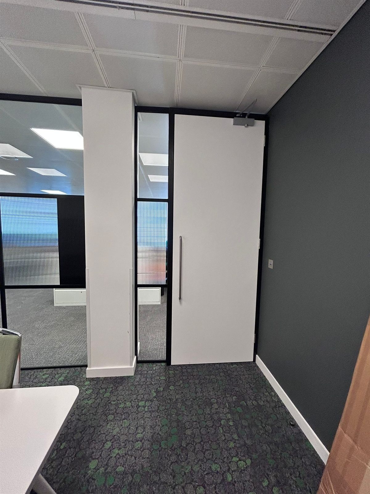 New commercial doorset with flush leaf, glazed side screen and steel push plate
