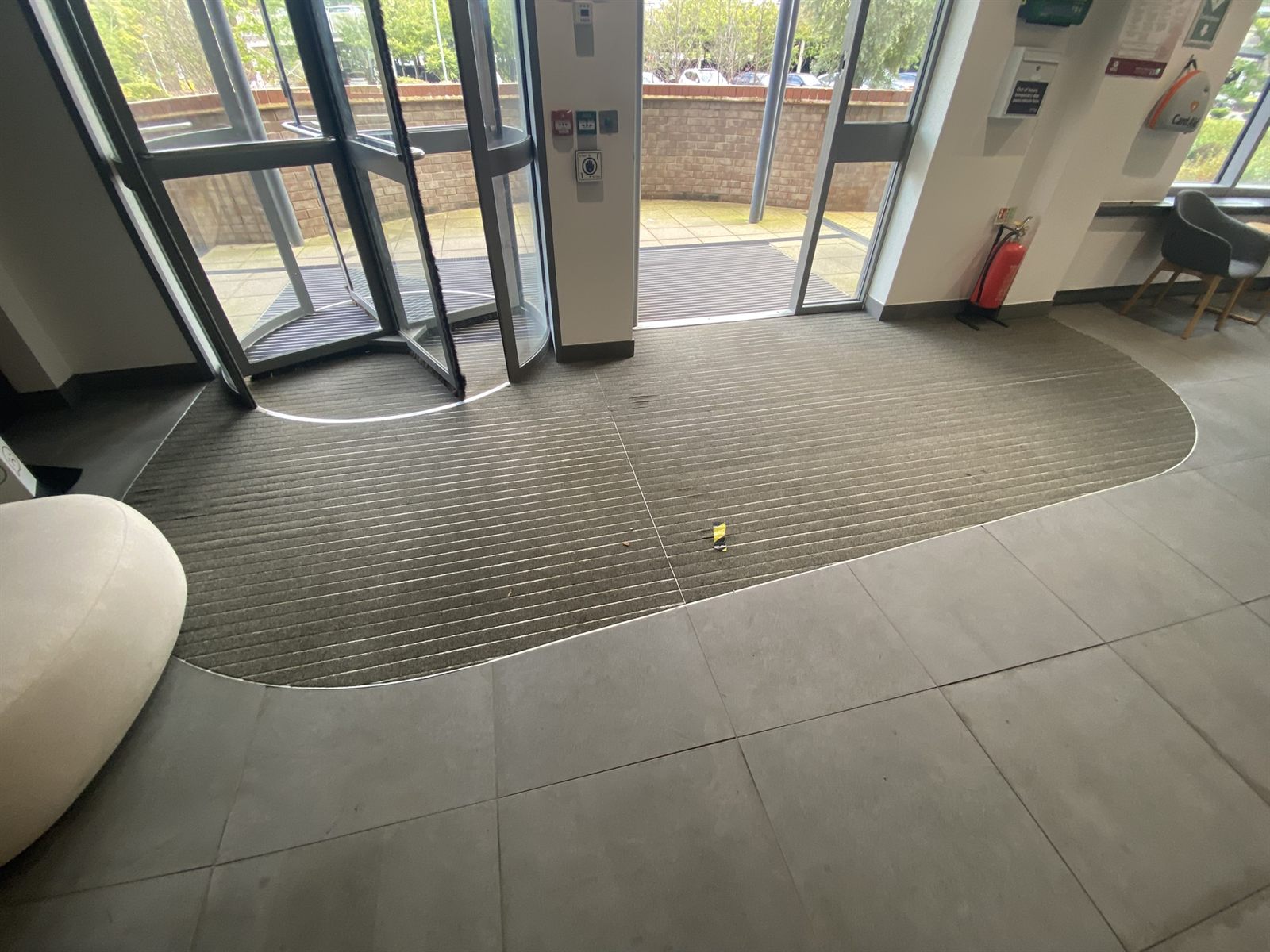 Worn existing entrance matting before replacement