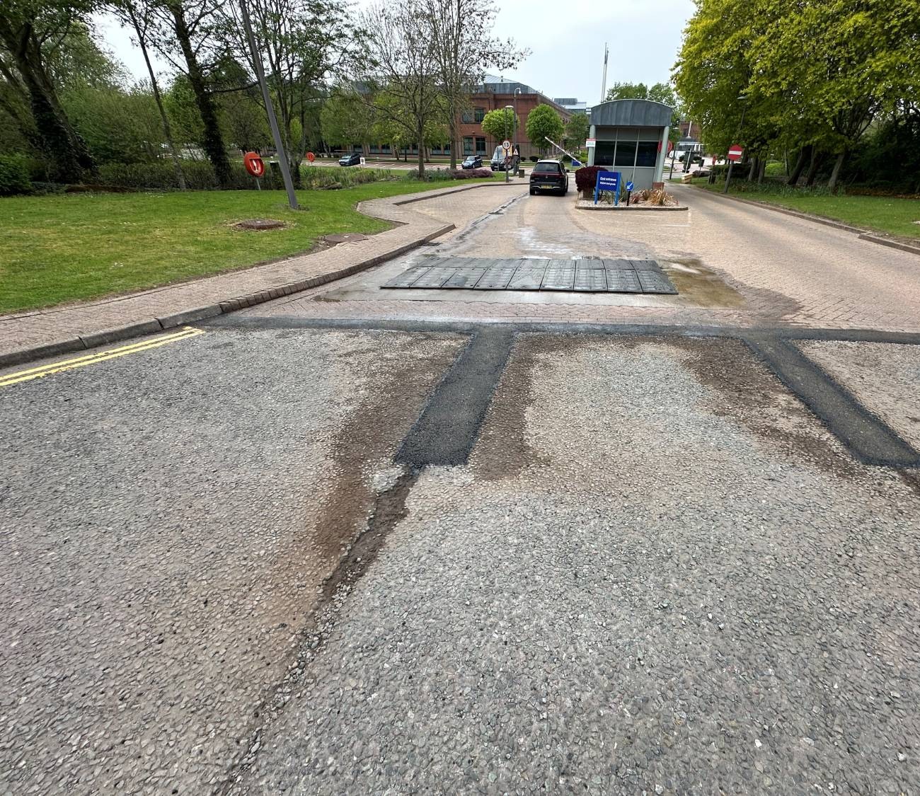 Tarmac repairs to a site access road and speed table