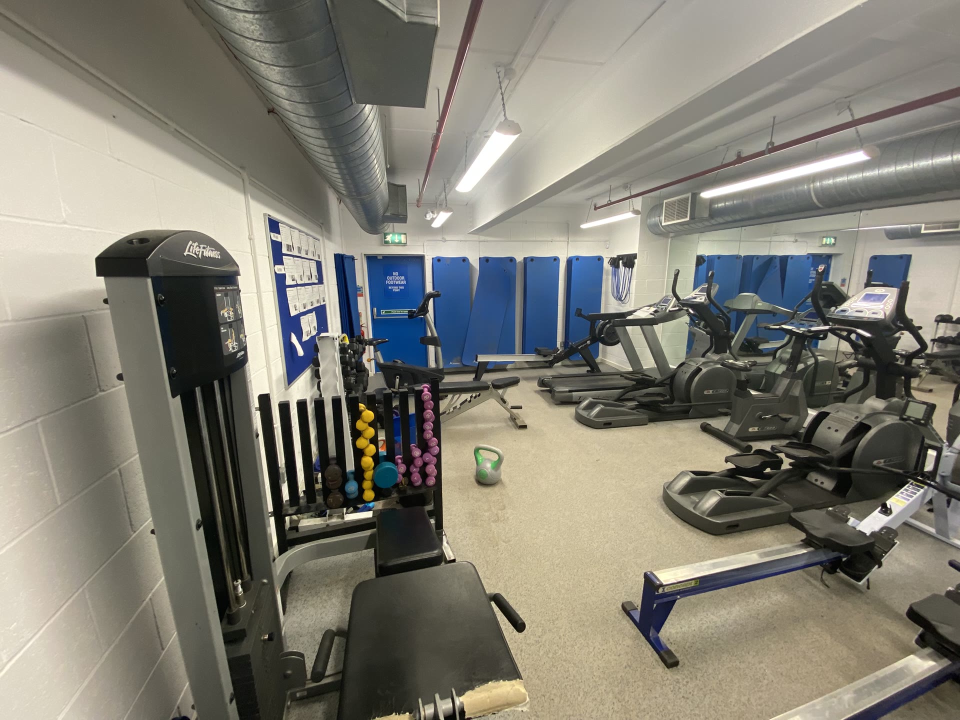 Whitecross School gym before refurbishment, with older equipment